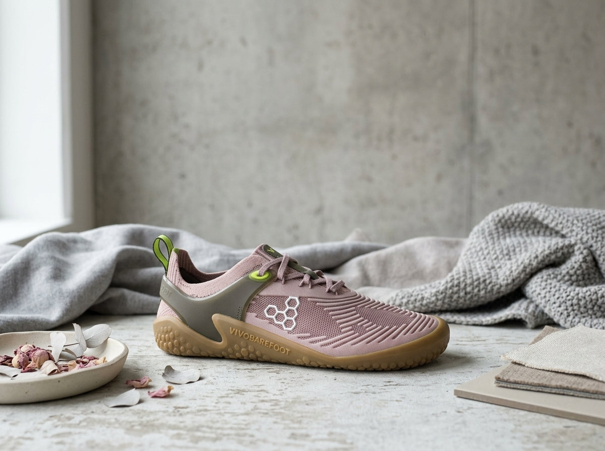 Vivobarefoot Motus Strength II Dusty Rose lifestyle in minimalist space